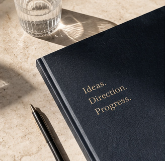 Navy notebook and stationery ready for career planning